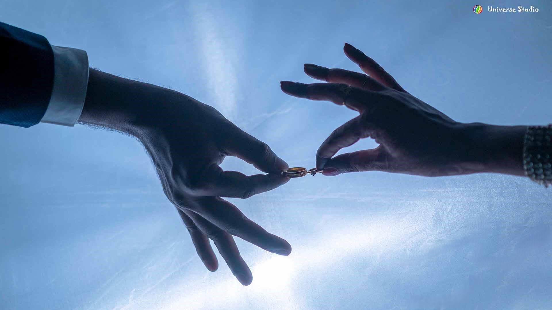 Beautiful wedding event setup with elegant decorations and lighting by Universe Studio."