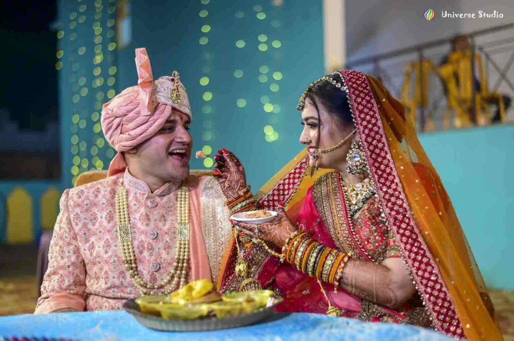 Bride and Groom feeding each other in Maunath Bhanjan
